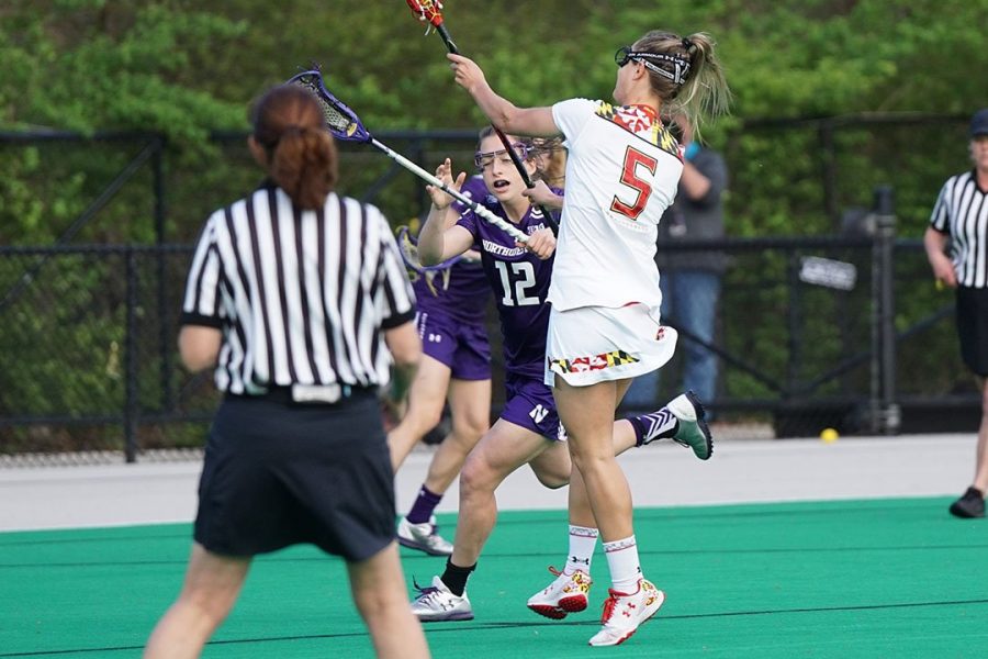 women playing lacrosse